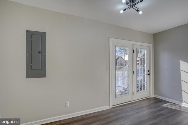 entrance foyer with dark wood-type flooring and electric panel