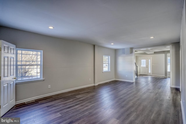 empty room featuring dark hardwood / wood-style floors