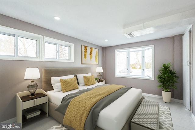 bedroom with light tile patterned flooring