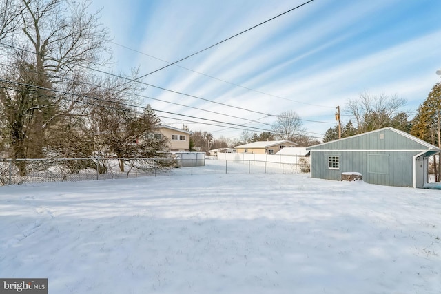 view of yard covered in snow