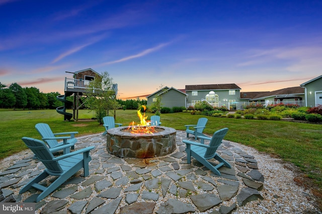 view of patio with an outdoor fire pit