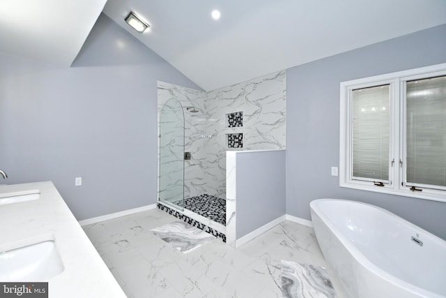 bathroom featuring vanity, shower with separate bathtub, and vaulted ceiling