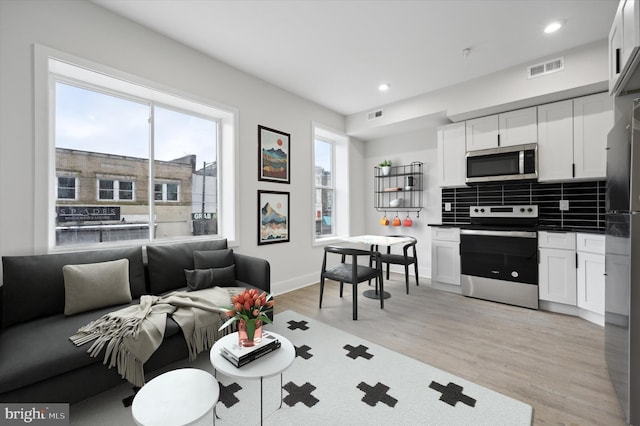 living room with light wood-type flooring