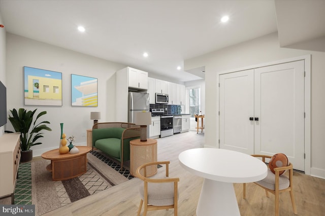 living room with light wood-type flooring