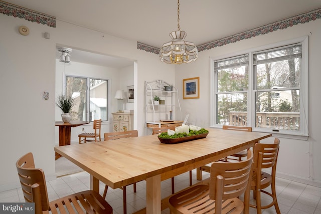 view of tiled dining space