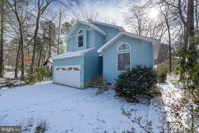 view of property featuring a garage