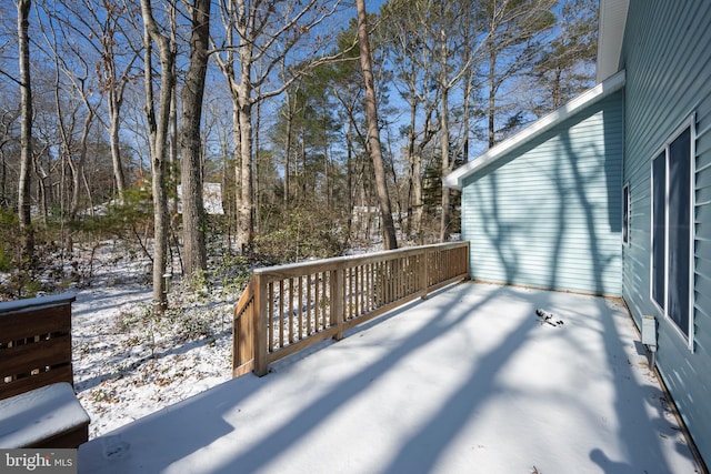 view of snow covered deck