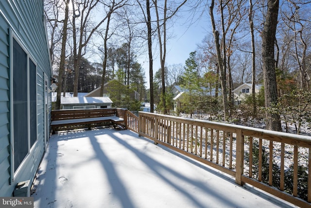 view of snow covered deck