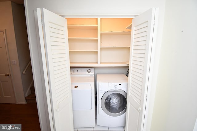 washroom featuring separate washer and dryer