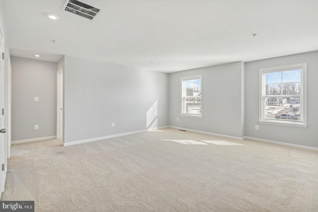 view of carpeted spare room