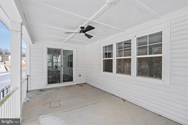 view of patio featuring ceiling fan