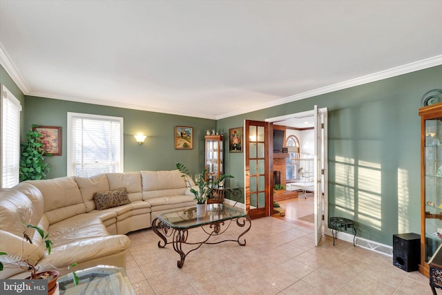 living room with crown molding and light tile patterned floors