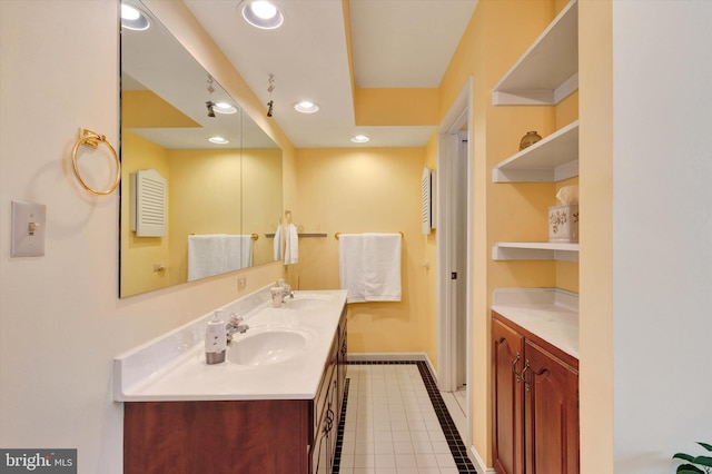 bathroom featuring tile patterned floors and vanity