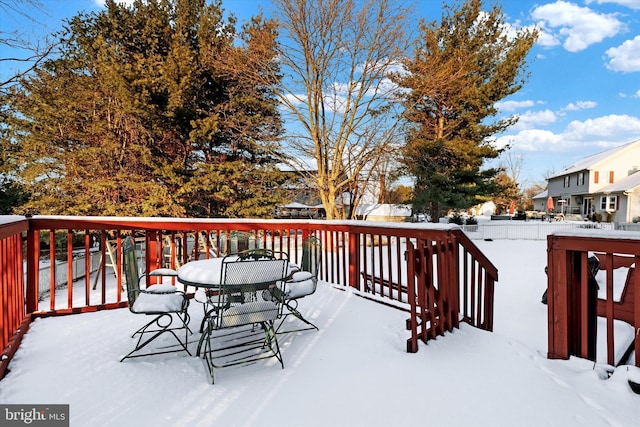 view of snow covered deck