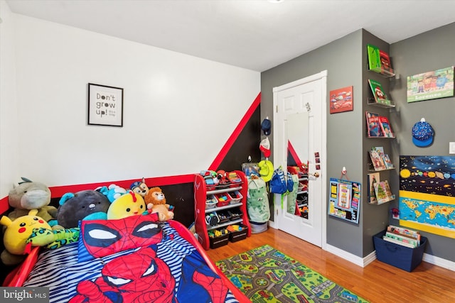 bedroom featuring hardwood / wood-style flooring