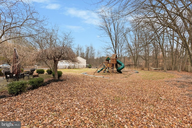 view of yard with a playground