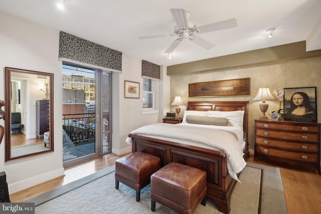 bedroom with ceiling fan, access to exterior, and light wood-type flooring