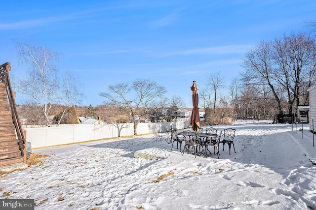 view of snowy yard