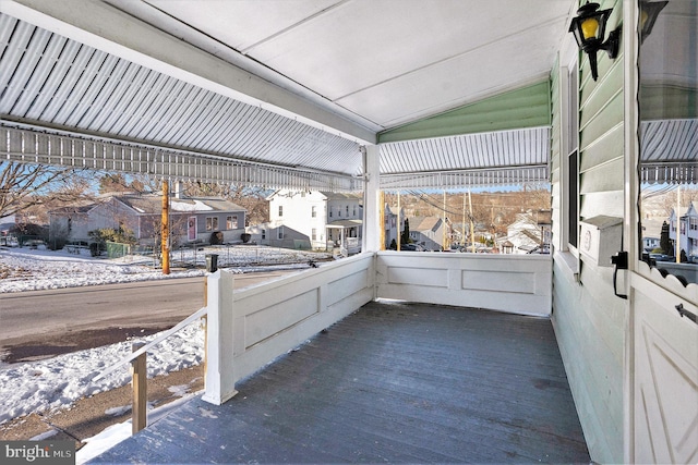 view of snow covered patio