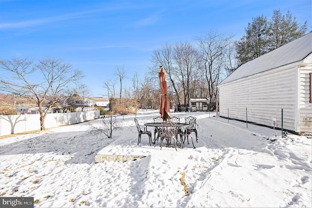 view of yard covered in snow