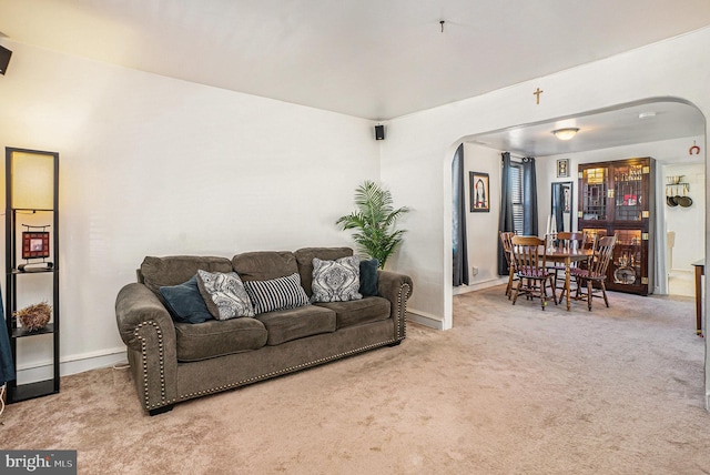 living room with light colored carpet