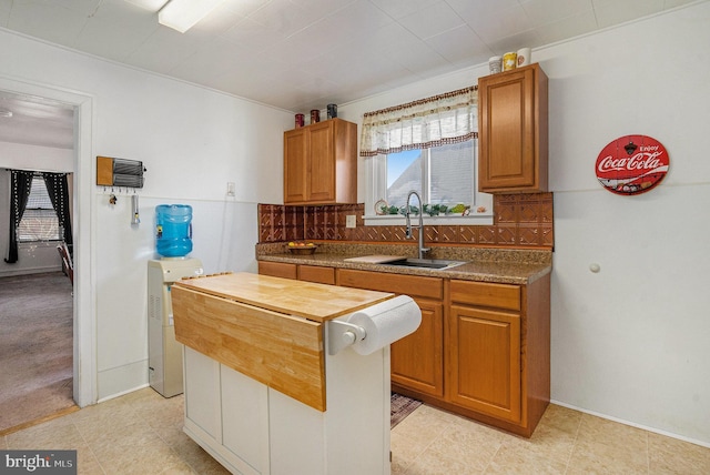 kitchen with sink and backsplash