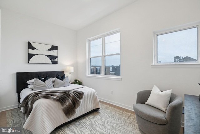 bedroom with light hardwood / wood-style floors