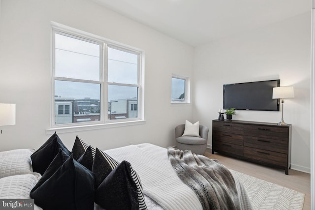 bedroom featuring light wood-type flooring