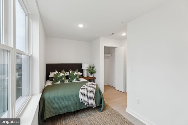 bedroom featuring light hardwood / wood-style flooring