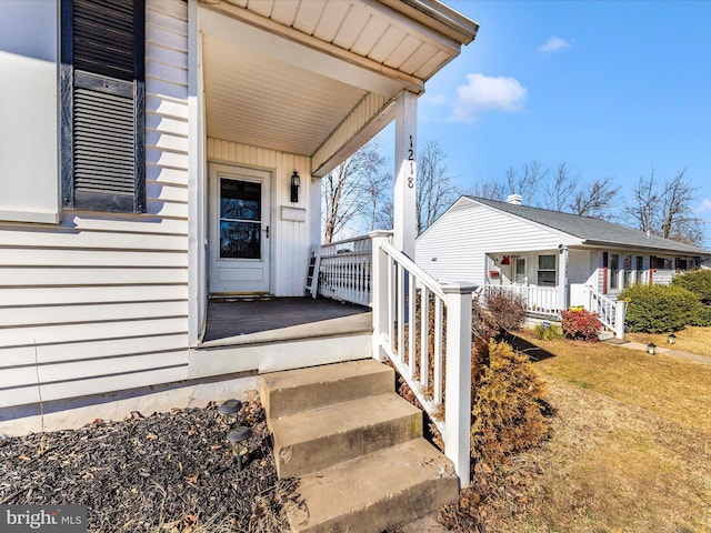 entrance to property with covered porch