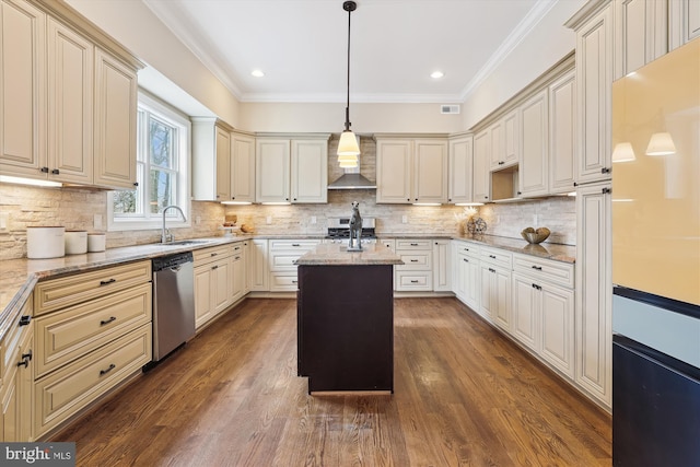 kitchen with light stone counters, wall chimney range hood, a center island, dishwasher, and decorative light fixtures