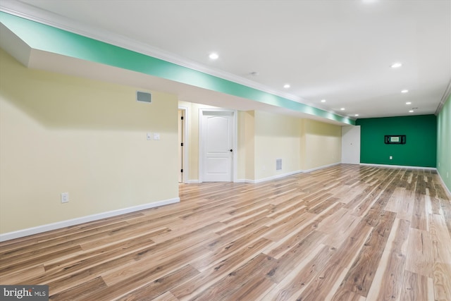 interior space featuring baseboards, light wood-style flooring, and recessed lighting