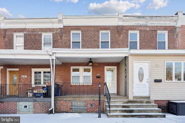 multi unit property with ceiling fan and covered porch