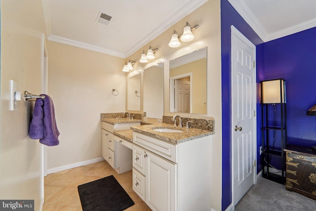 bathroom with crown molding, tile patterned floors, and vanity