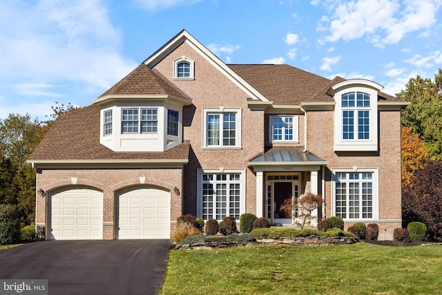 view of front of home with a front yard