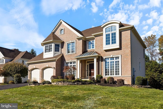 view of front of home featuring a front yard