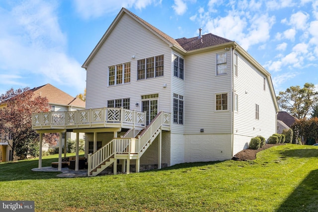 back of house with a yard and a deck