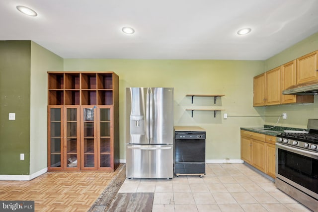 kitchen with light tile patterned floors and appliances with stainless steel finishes