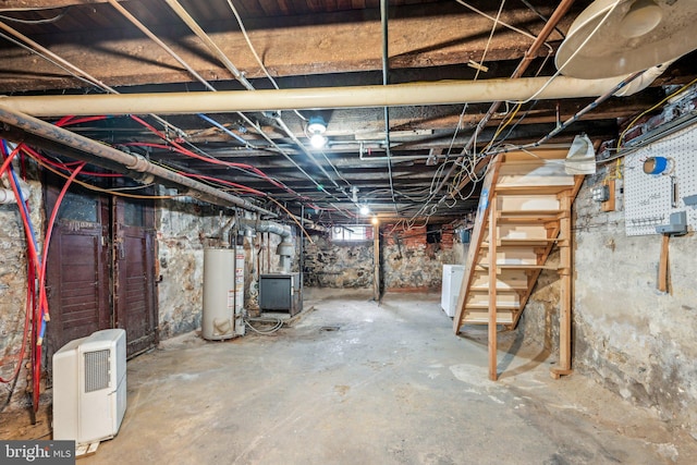 basement with washer / dryer and gas water heater