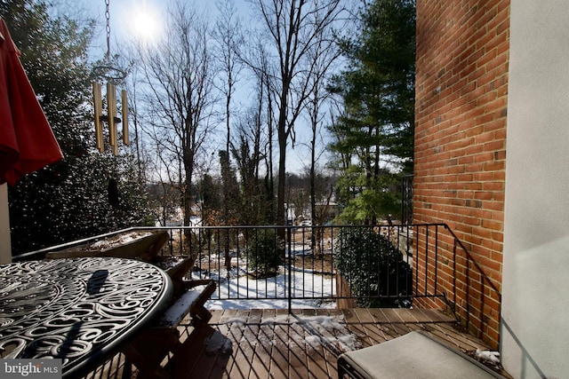 view of snow covered deck