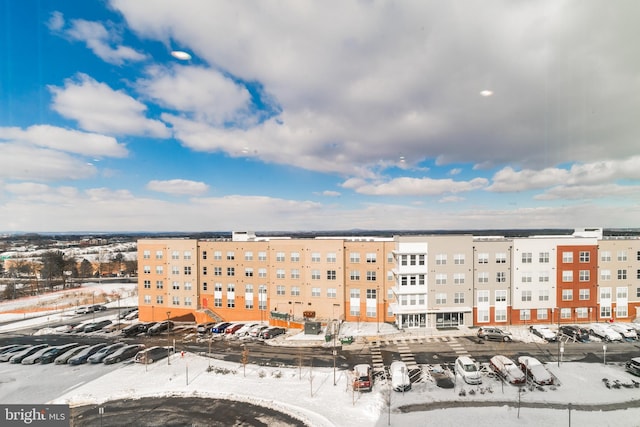 view of snow covered property