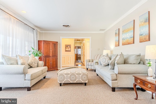 living room with light colored carpet and crown molding