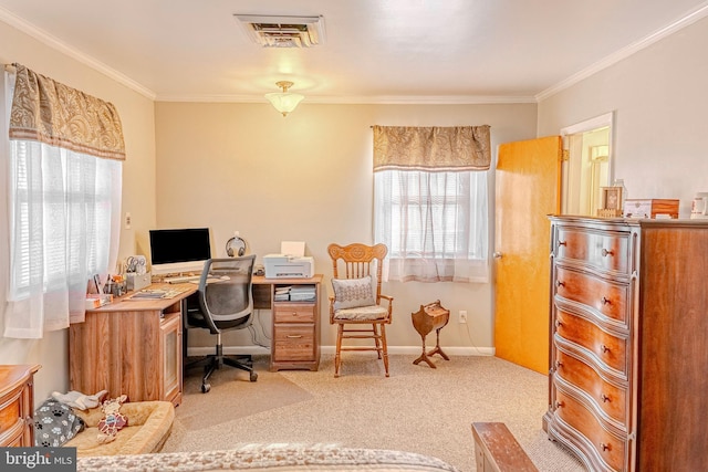 carpeted office space featuring a healthy amount of sunlight and ornamental molding