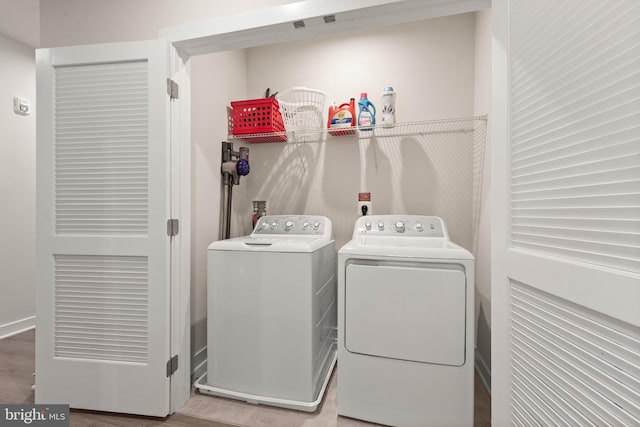 laundry room featuring independent washer and dryer