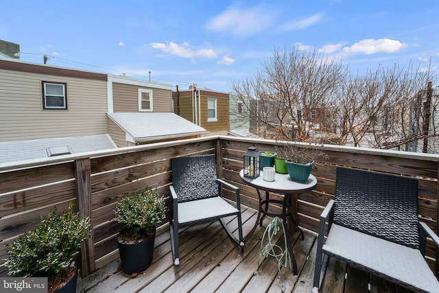 view of snow covered deck