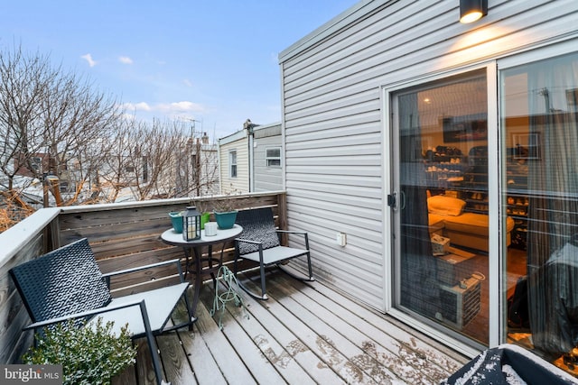 view of snow covered deck