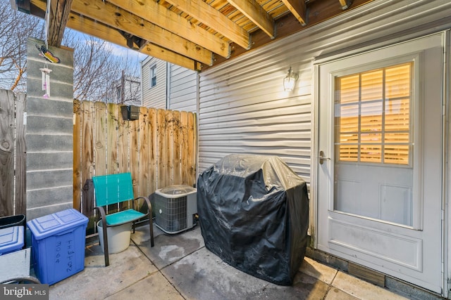 view of patio with central AC and grilling area