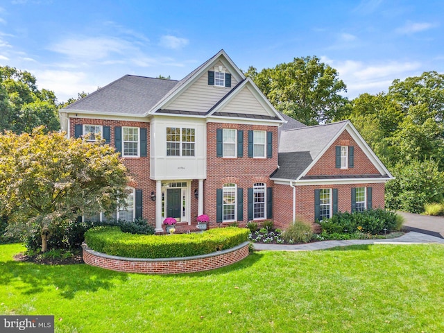 view of front of house with a front yard