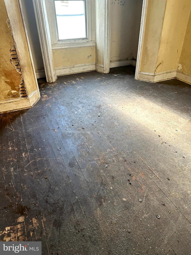 interior details featuring hardwood / wood-style flooring