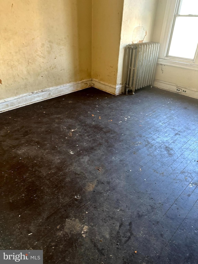 empty room featuring radiator